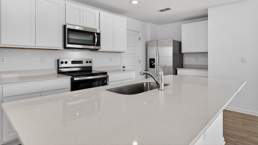 Representative furnished interior of a home built from the Elston+ by D.R. Horton in Diamond Springs, Jacksonville (Image 4).