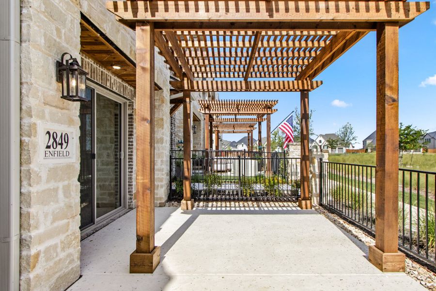 Exterior details and patio area of a home in The Tribute, The Colony (Image 3).