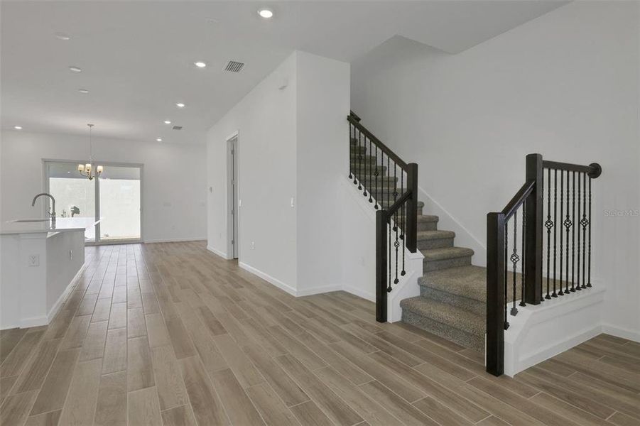 Spacious, unfurnished interior of a new home in Serenade at Ovation, Winter Garden (Image 21).
