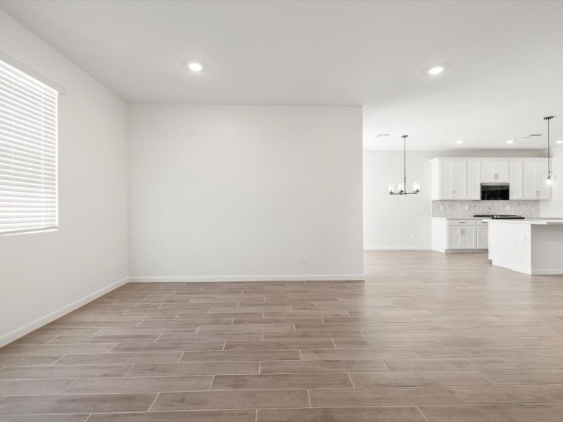 Spacious, unfurnished interior of a new home in Blossom Rock Reserve Series, Apache Junction (Image 8).