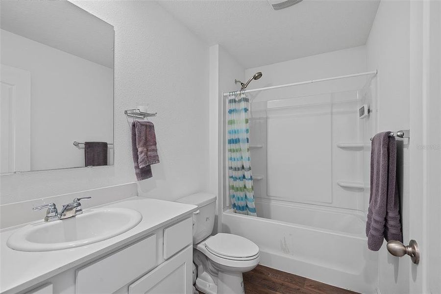 Furnished interior view inside a new home in Sawmill Branch, Palm Coast (Image 39).