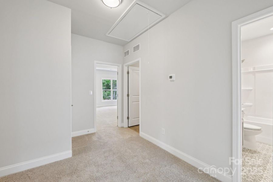 Spacious, unfurnished interior of a new home in Walk23, Huntersville (Image 37).