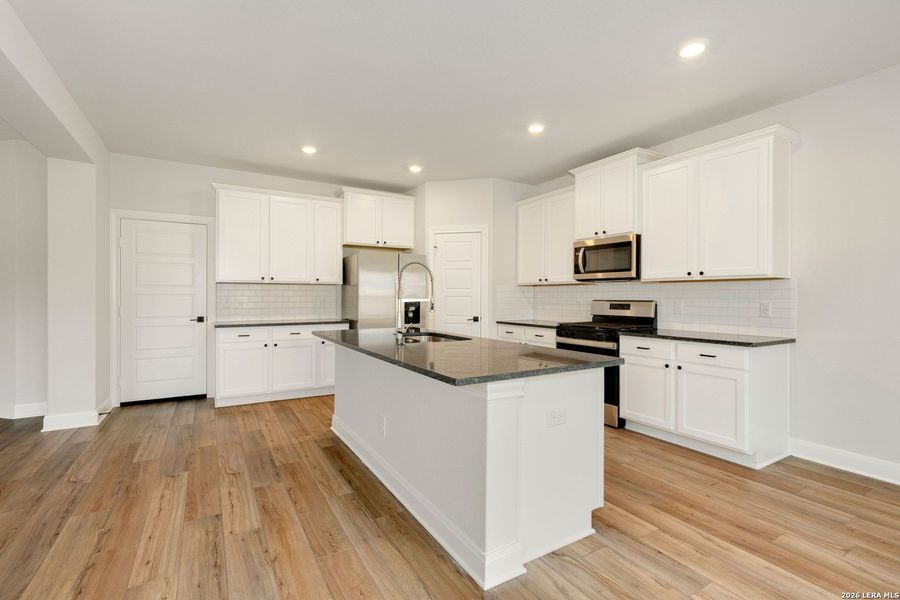 Furnished interior view inside a new home in Hightop Ridge, Converse (Image 6).