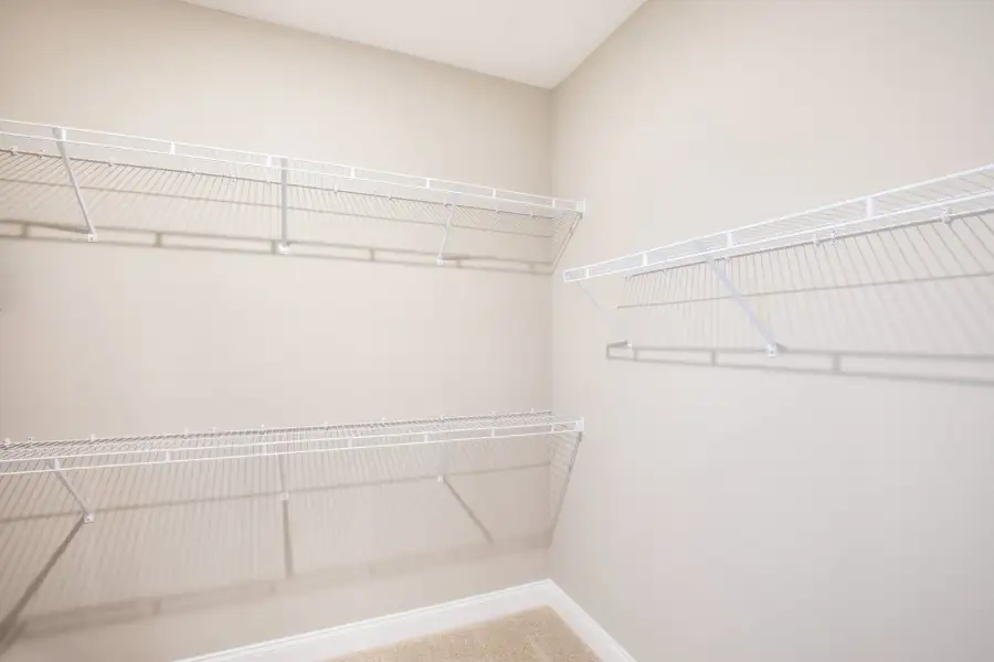 Representative unfurnished interior of a home built from the Huntington by Maronda Homes in Malabar Springs, Palm Bay (Image 20).