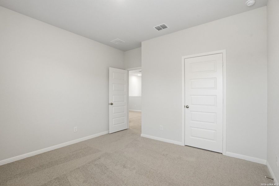 Spacious, unfurnished interior of a new home in Melissa Ranch, San Antonio (Image 13).