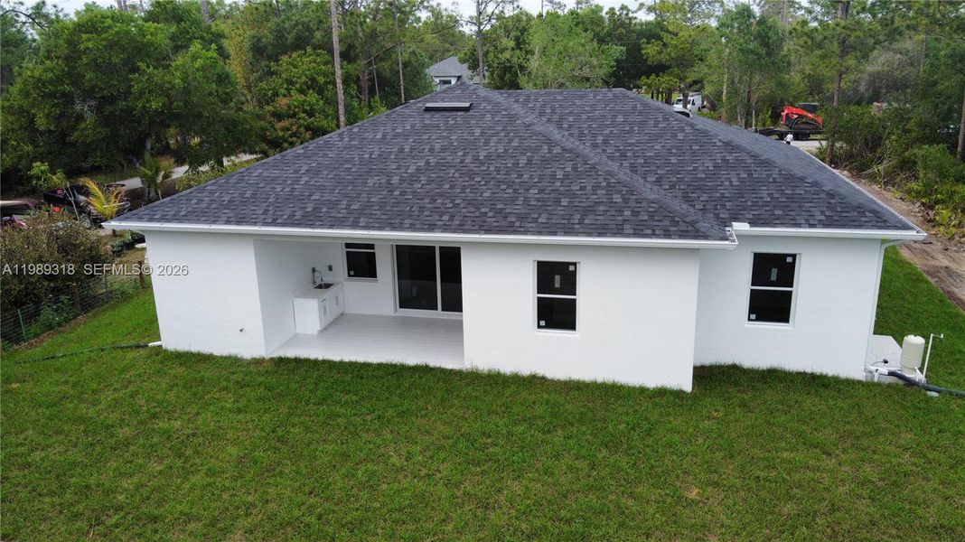 Exterior details and patio area of a home in , Naples (Image 17). Exterior details and patio area of a home in , Naples (Image 17).