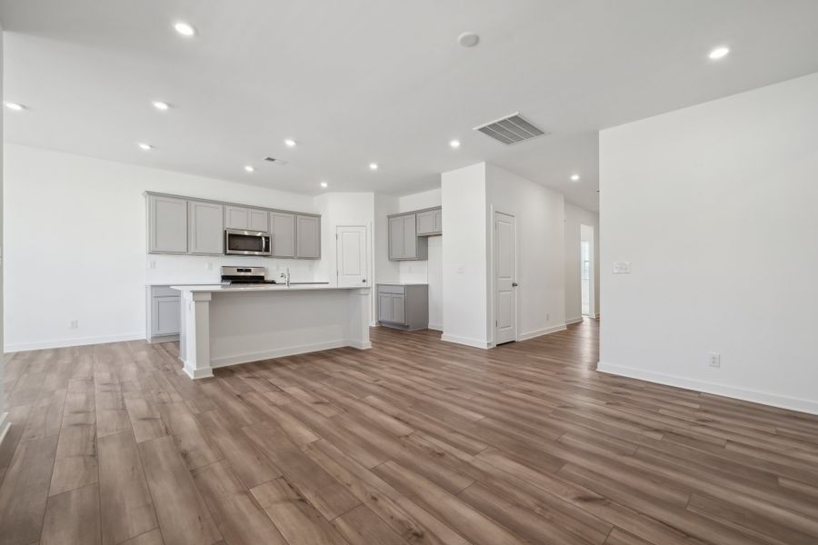 A large empty kitchen. A large empty kitchen.