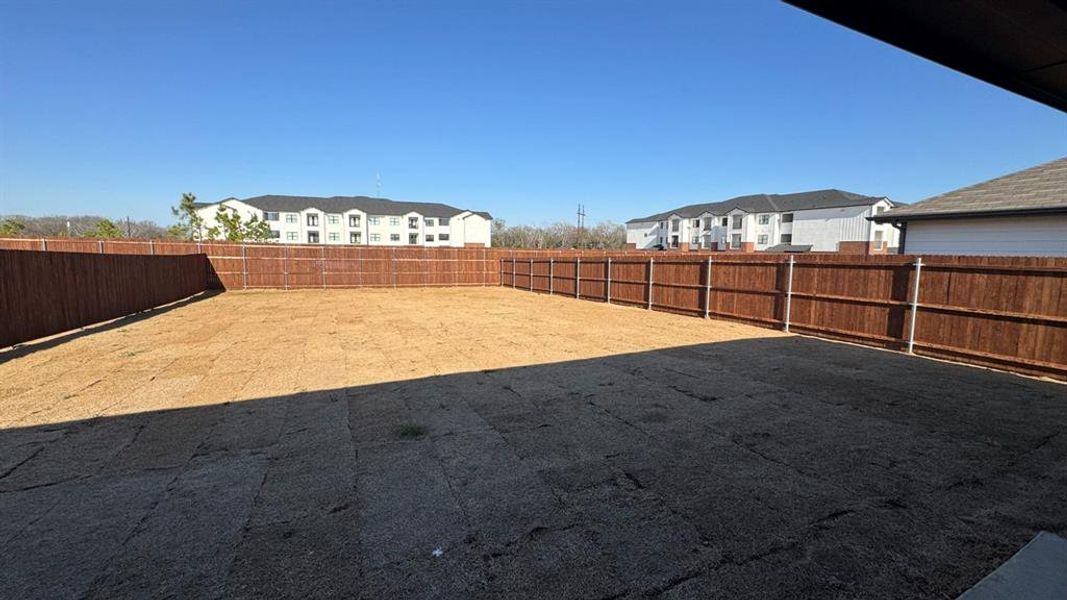 Exterior details and patio area of a home in Creeks at Burnett Trail, Canton (Image 3).