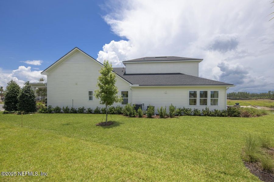 Exterior details and patio area of a home in Amelia National Country Club, Fernandina Beach (Image 16). Exterior details and patio area of a home in Amelia National Country Club, Fernandina Beach (Image 16).