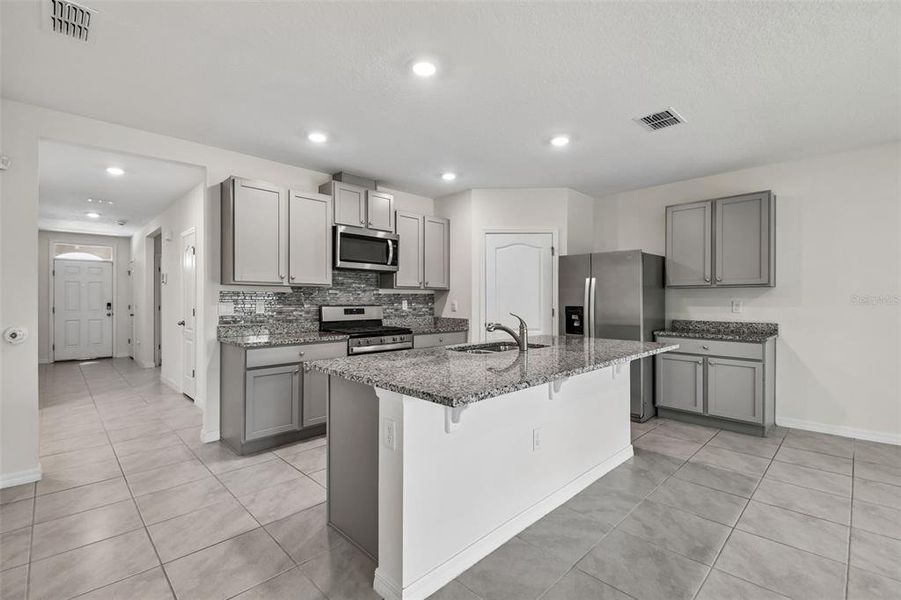 Furnished interior view inside a new home in Riviera Bella, Debary (Image 6).