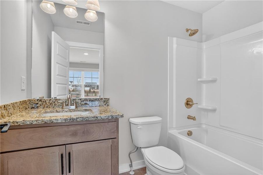 Furnished interior view inside a new home in The Fairways at Mirror Lake, Villa Rica (Image 11).
