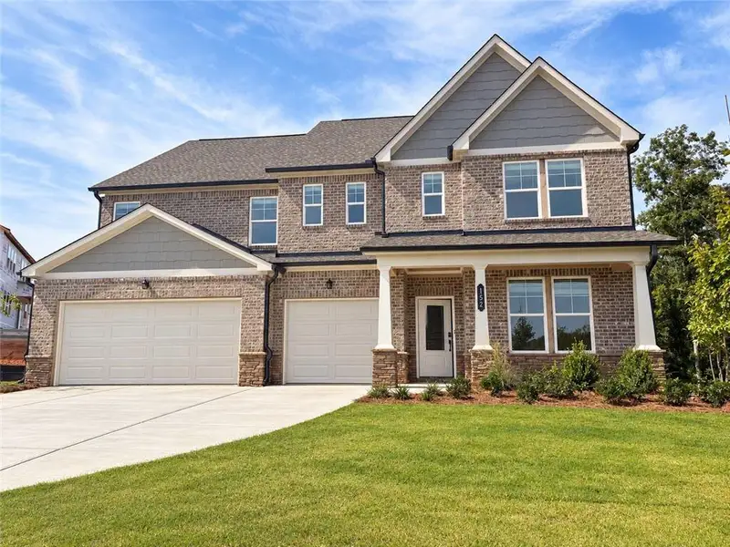 Front exterior of a new home in , McDonough, GA, highlighting curb appeal (Image 1). Front exterior of a new home in , McDonough, GA, highlighting curb appeal (Image 1).