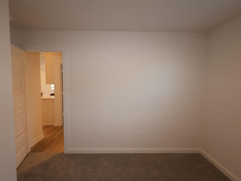Spacious, unfurnished interior of a new home in Pinewood at Grand Texas, New Caney (Image 27).