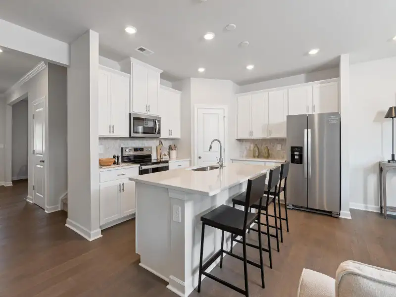 Fill the oversized kitchen island with appetizers for hosting. Fill the oversized kitchen island with appetizers for hosting.