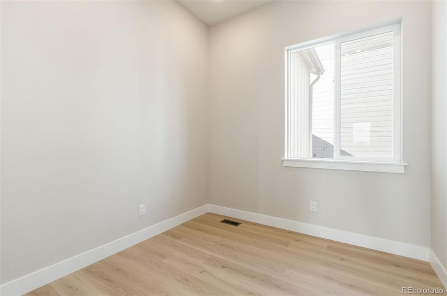 Spacious, unfurnished interior of a new home in Kitchel Lake at Serratoga Falls, Timnath (Image 24).