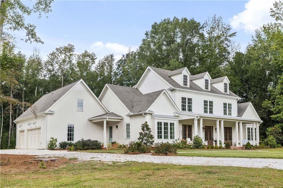 Front exterior of a new home in , Chattahoochee Hills, GA, highlighting curb appeal (Image 19).
