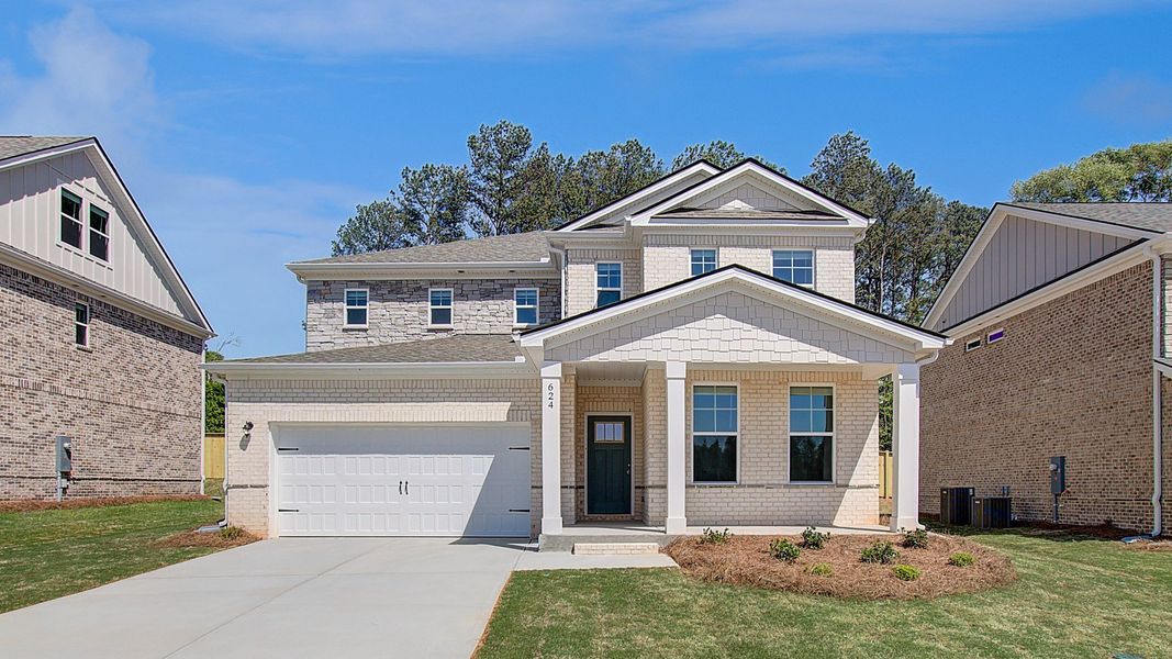 Representative exterior photo of a completed home built from the Wynwood by DRB Homes in Bowers Farm, McDonough, GA (Image 24).