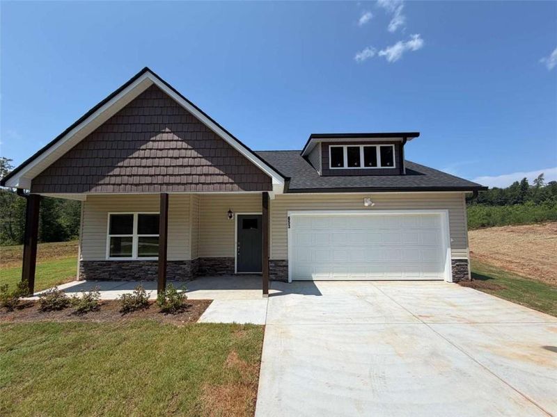 Front exterior of a new home in , Eastanollee, GA, highlighting curb appeal (Image 18).