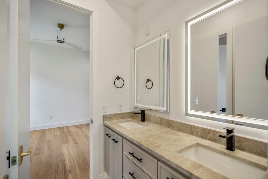 Full bathroom that connect bedroom #3 and #4 with Taj Mahal counter tops and soft close drawers and cabinets. Full bathroom that connect bedroom #3 and #4 with Taj Mahal counter tops and soft close drawers and cabinets.