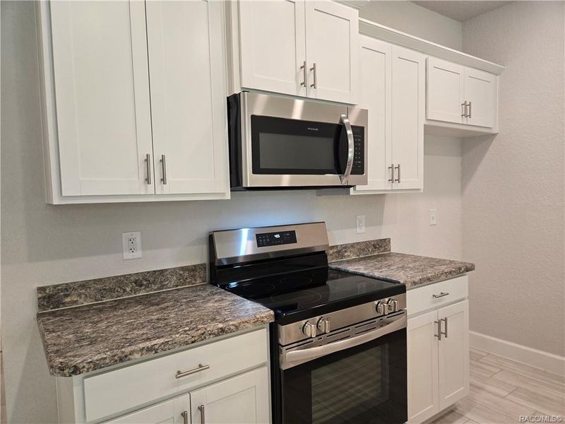 Furnished interior view inside a new home in Wyld Palms, Inverness (Image 5). Furnished interior view inside a new home in Wyld Palms, Inverness (Image 5).