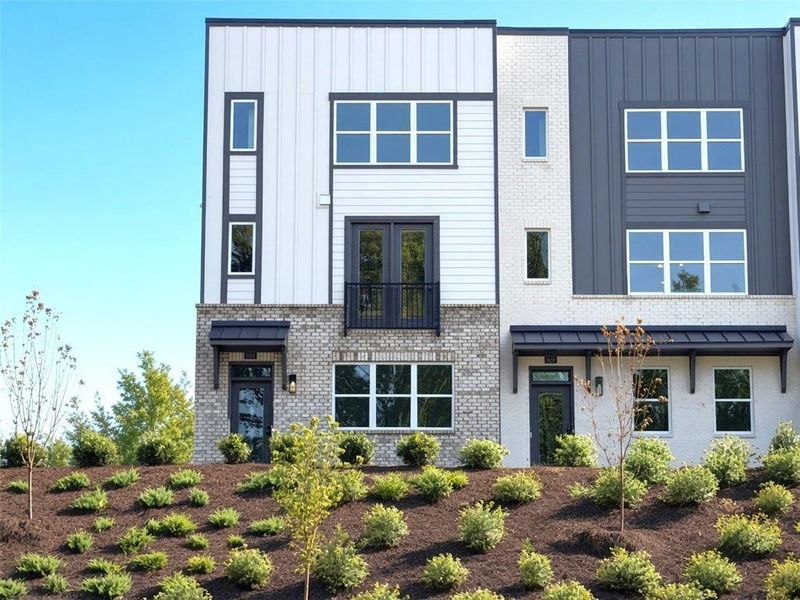 Front exterior of a new home in Overlook at Peachtree Corners, Peachtree Corners, GA, highlighting curb appeal (Image 2).
