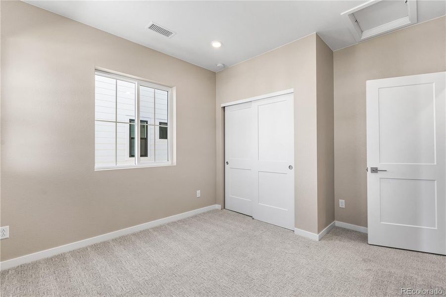 Spacious, unfurnished interior of a new home in Harmony at Solstice, Littleton (Image 21).