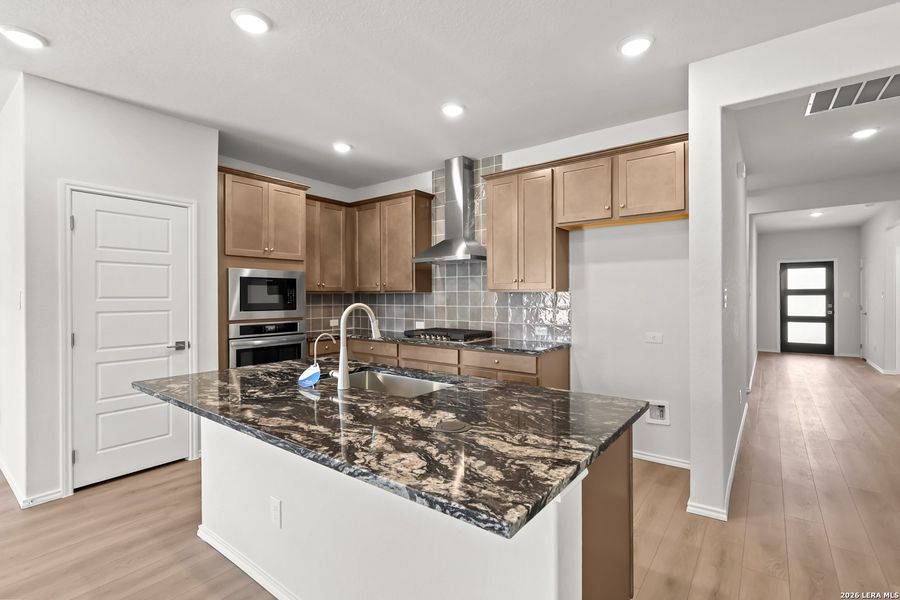 Furnished interior view inside a new home in Bricewood, San Antonio (Image 9).