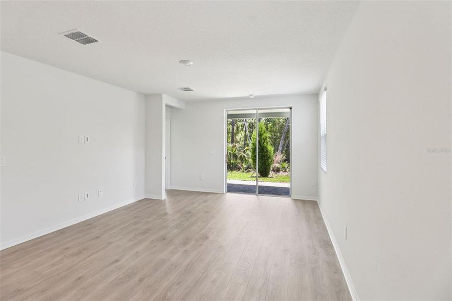 Spacious, unfurnished interior of a new home in Ridgehaven - Villas, Ormond Beach (Image 16).