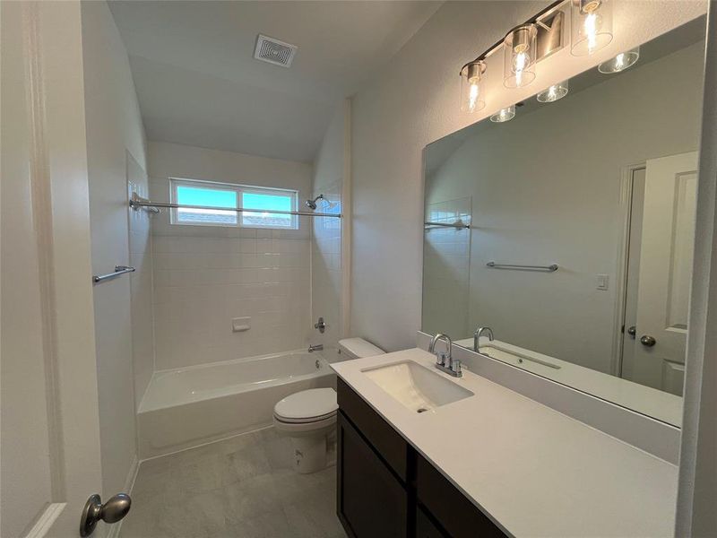 Furnished interior view inside a new home in Wellspring, Round Rock (Image 11).