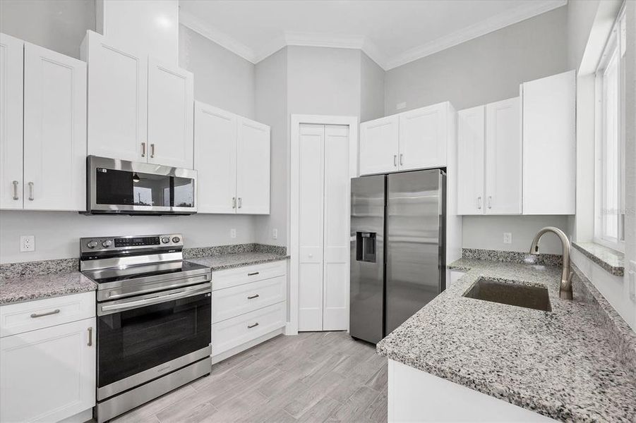 Furnished interior view inside a new home in , Port Charlotte (Image 5).