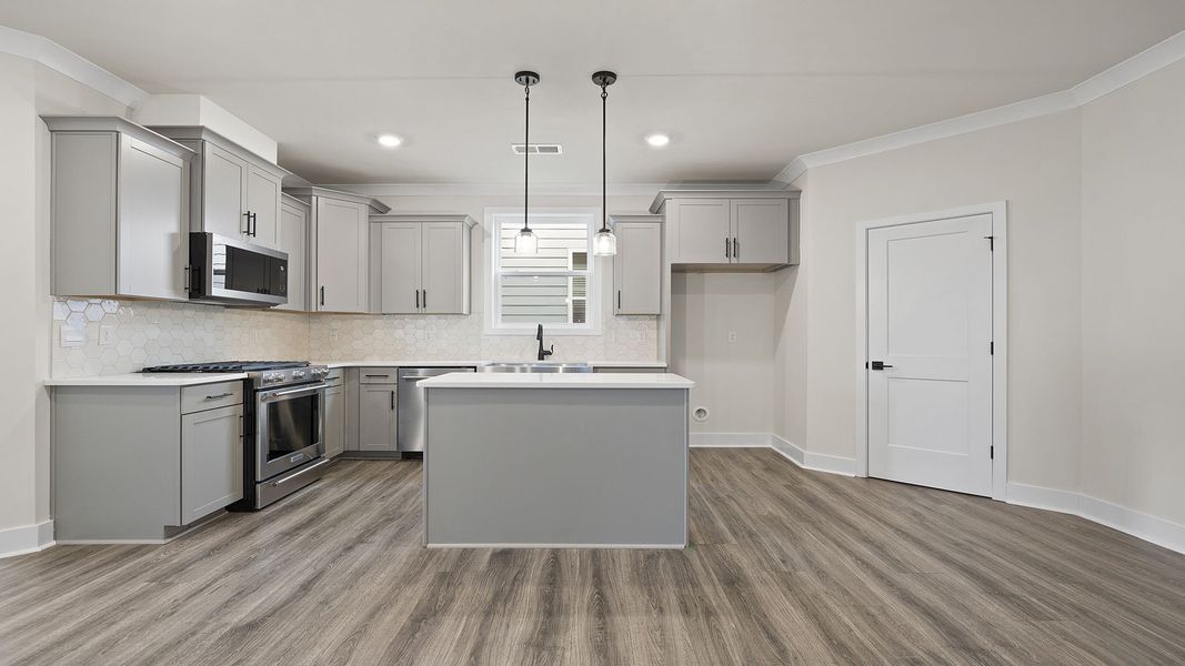 Representative furnished interior of a home built from the BERKSHIRE by D.R. Horton in Sycamore Cove, Woodruff (Image 6).