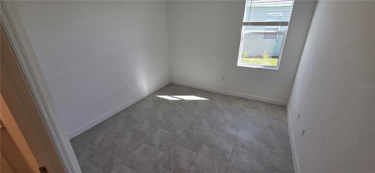 Spacious, unfurnished interior of a new home in Rye Ranch: Manor Homes, Parrish (Image 8).