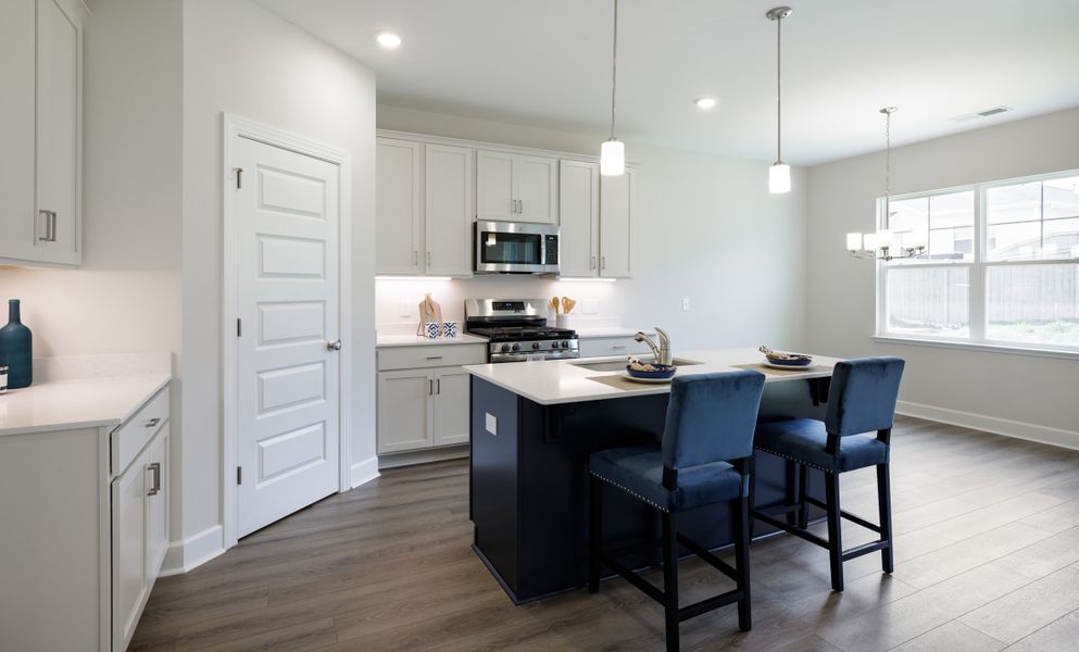 Representative furnished interior of a home built from the The Prescott by Cothran Homes in Holly Ridge, Greenville (Image 5).