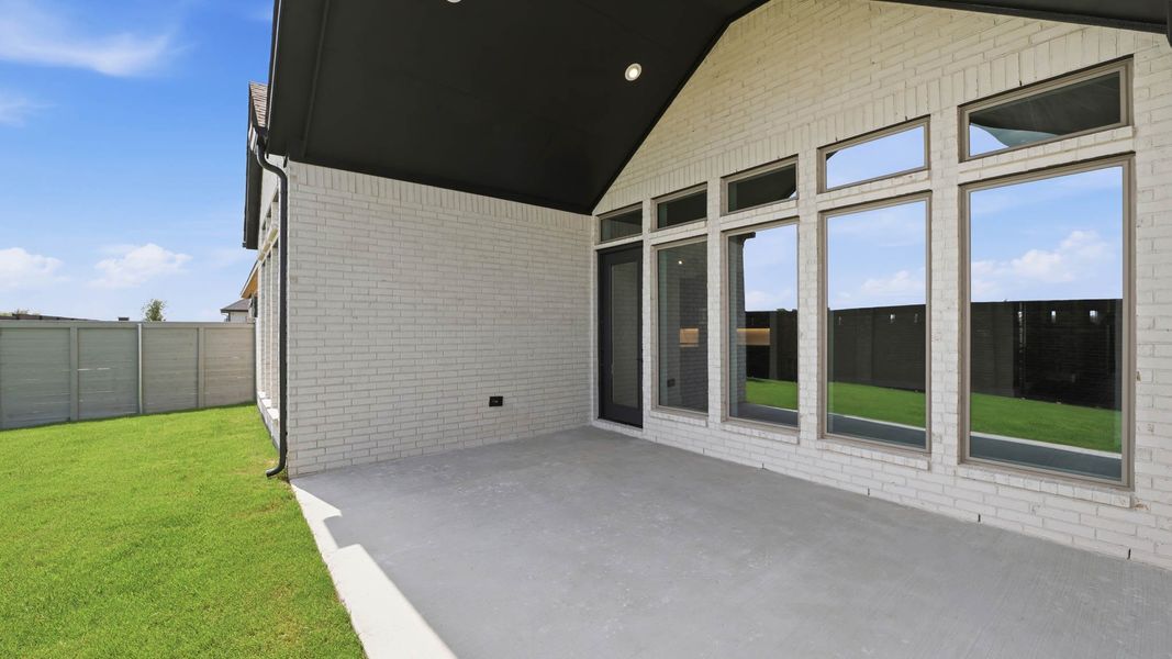 Exterior details and patio area of a home in Landmark, Denton (Image 3). Exterior details and patio area of a home in Landmark, Denton (Image 3).