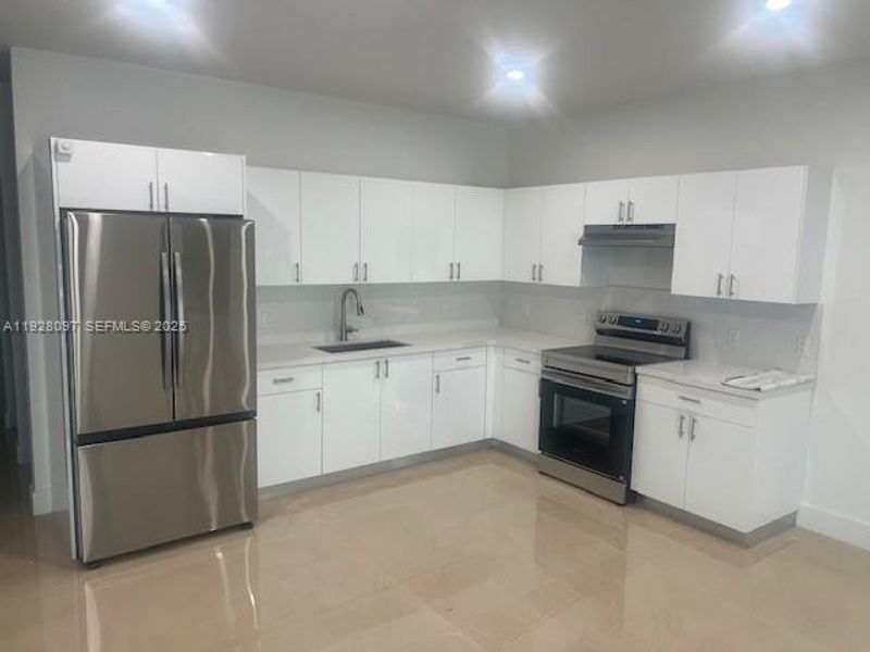Furnished interior view inside a new home in , Miami (Image 9).