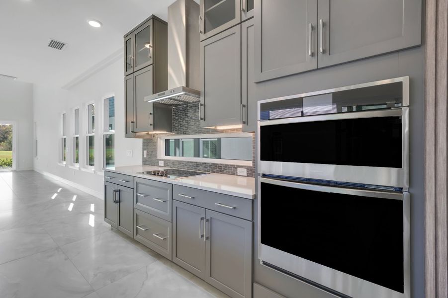 Representative furnished interior of a home built from the Courtyard 50 by ABD Development in Hampton Green at Providence, Davenport (Image 11).