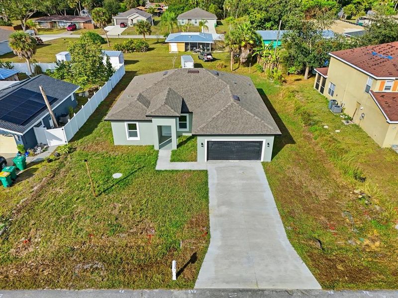 Front exterior of a new home in , Port Charlotte, FL, highlighting curb appeal (Image 2). Front exterior of a new home in , Port Charlotte, FL, highlighting curb appeal (Image 2).