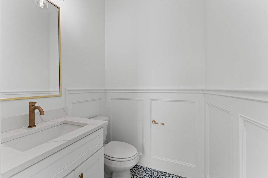 Powder bath. *Previous Brownstone Living project, selections and floor plans may vary.*