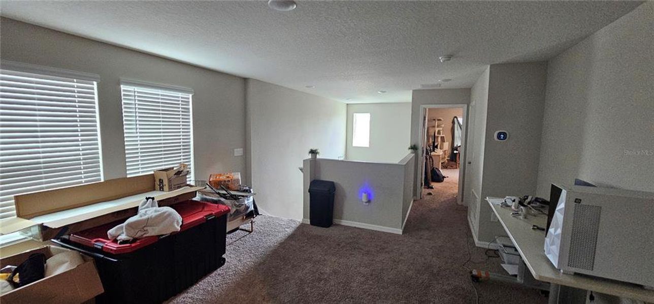 Furnished interior view inside a new home in Pasadena Point, Wesley Chapel (Image 4).