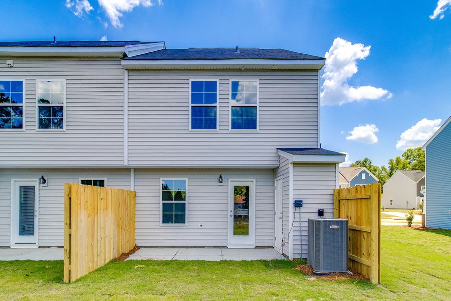 Exterior details and patio area of a home in Padgett Commons, Hopkins (Image 4).