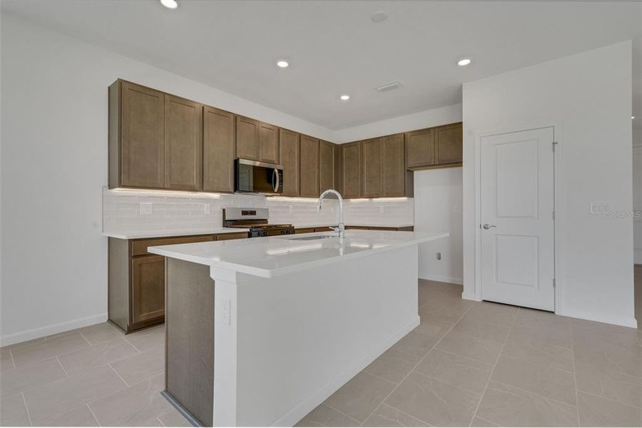 Furnished interior view inside a new home in Brystol North at Wylder, Port St. Lucie (Image 7).