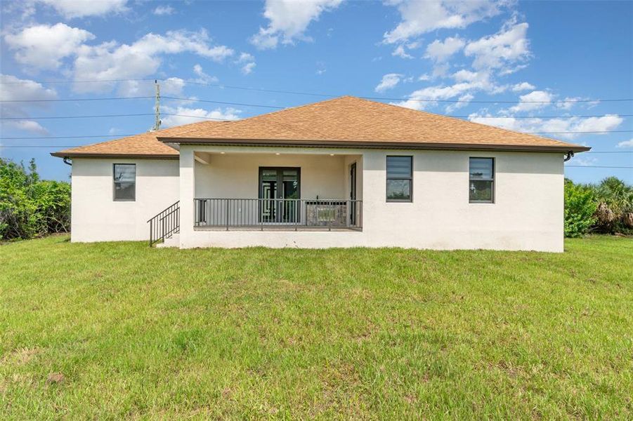 Front exterior of a new home in , Port Charlotte, FL, highlighting curb appeal (Image 17). Front exterior of a new home in , Port Charlotte, FL, highlighting curb appeal (Image 17).