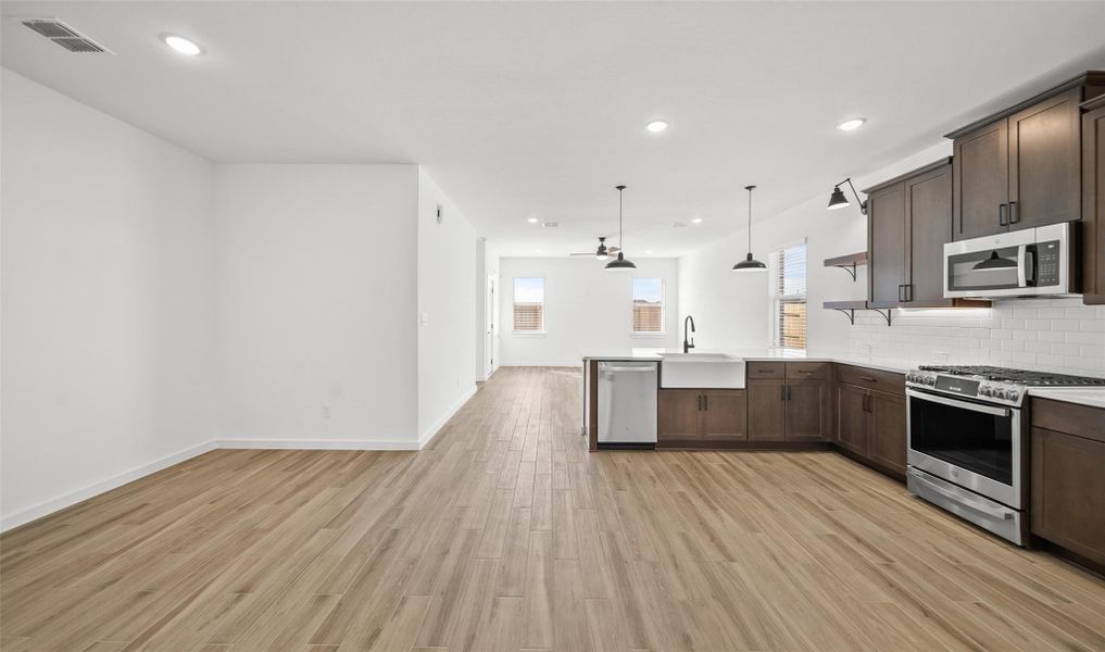 Stylish kitchen and dining area (*Photo not of actual home and used for illustration purposes only.) Stylish kitchen and dining area (*Photo not of actual home and used for illustration purposes only.)
