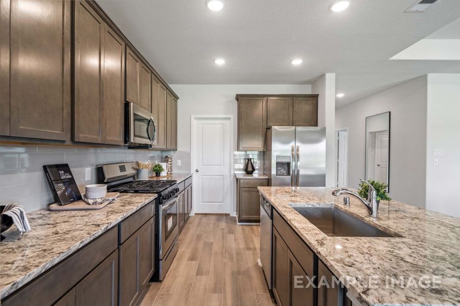 Representative furnished interior of a home built from the The Acadia with 3-Car Garage by Davidson Homes LLC in River Ranch Meadows, Dayton (Image 14).
