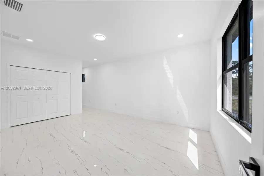 Spacious, unfurnished interior of a new home in , Lehigh Acres (Image 16). Spacious, unfurnished interior of a new home in , Lehigh Acres (Image 16).