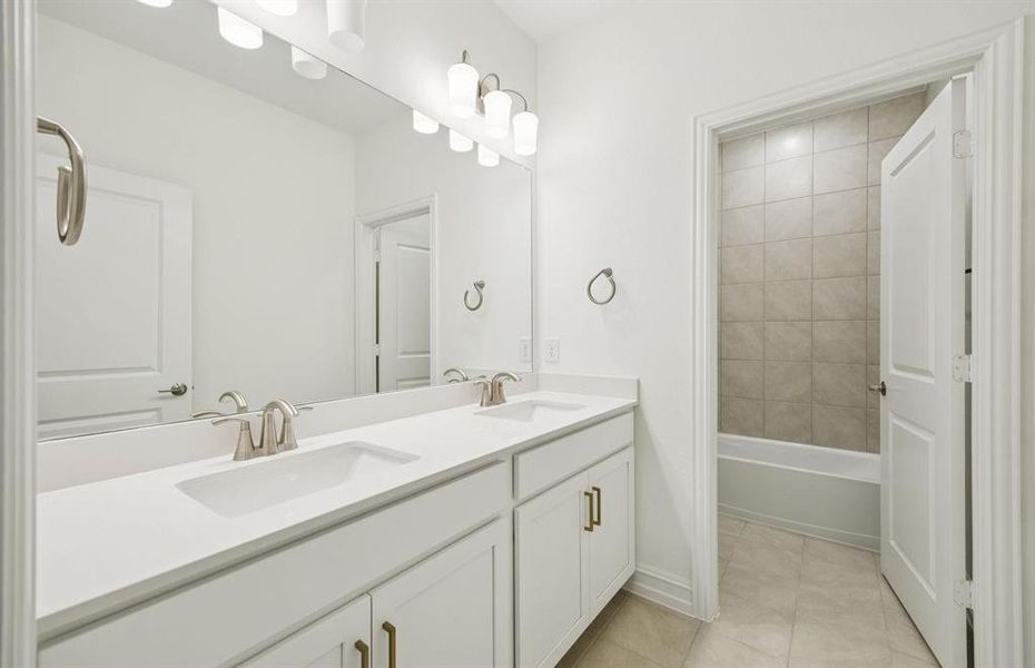 Stylish secondary bath with high-end fixtures *Real home pictured Stylish secondary bath with high-end fixtures *Real home pictured