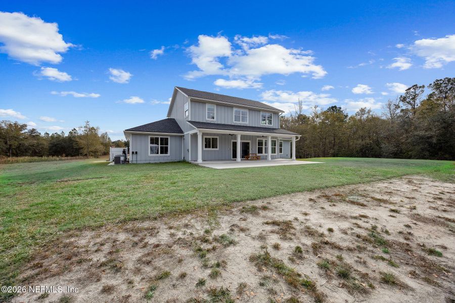Exterior details and patio area of a home in , Bryceville (Image 24).