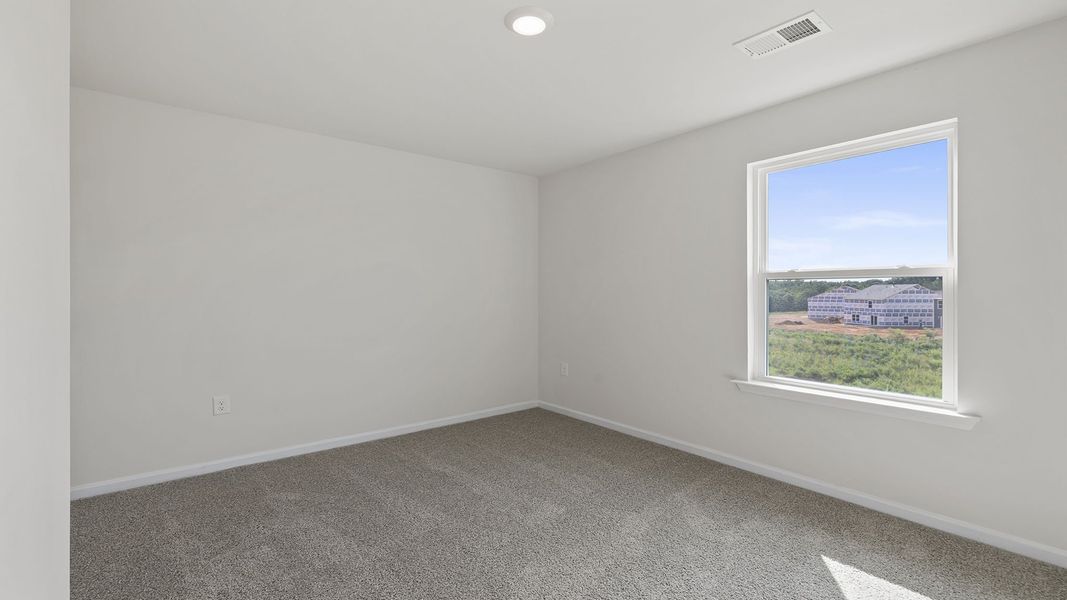 Spacious, unfurnished interior of a new home in Lightwood Cottages, Moore (Image 22).