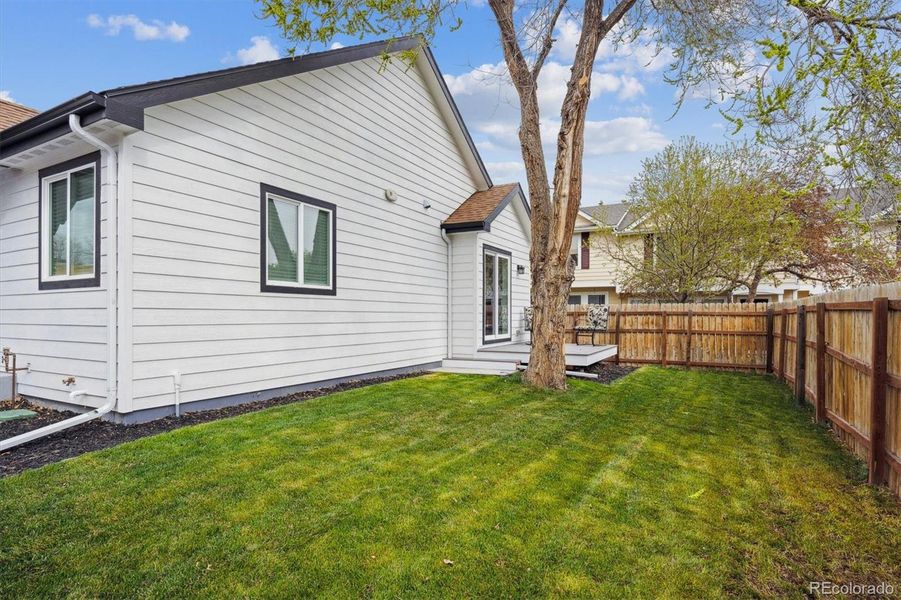 Front exterior of a new home in , Lakewood, CO, highlighting curb appeal (Image 1).