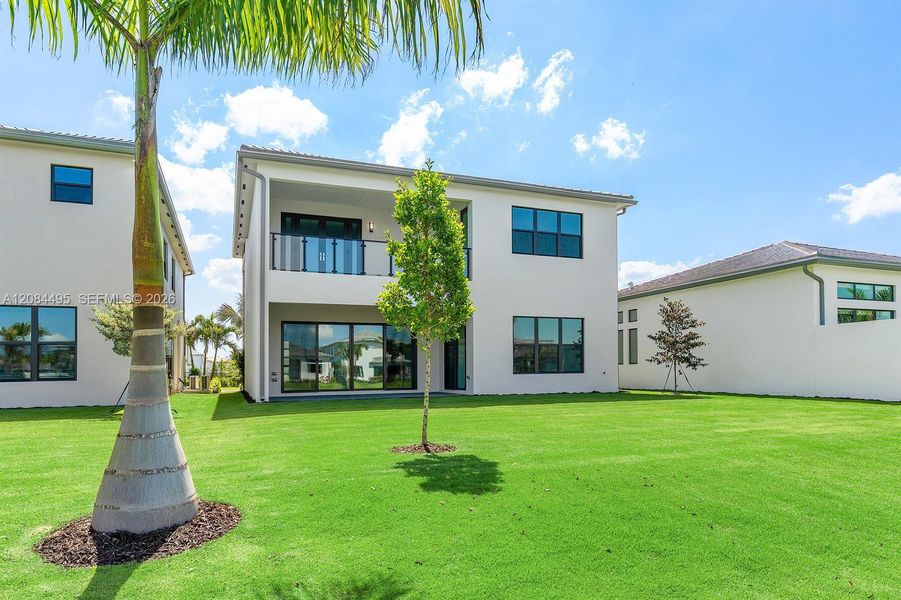 Exterior details and patio area of a home in Lotus Edge, Boca Raton (Image 27). Exterior details and patio area of a home in Lotus Edge, Boca Raton (Image 27).